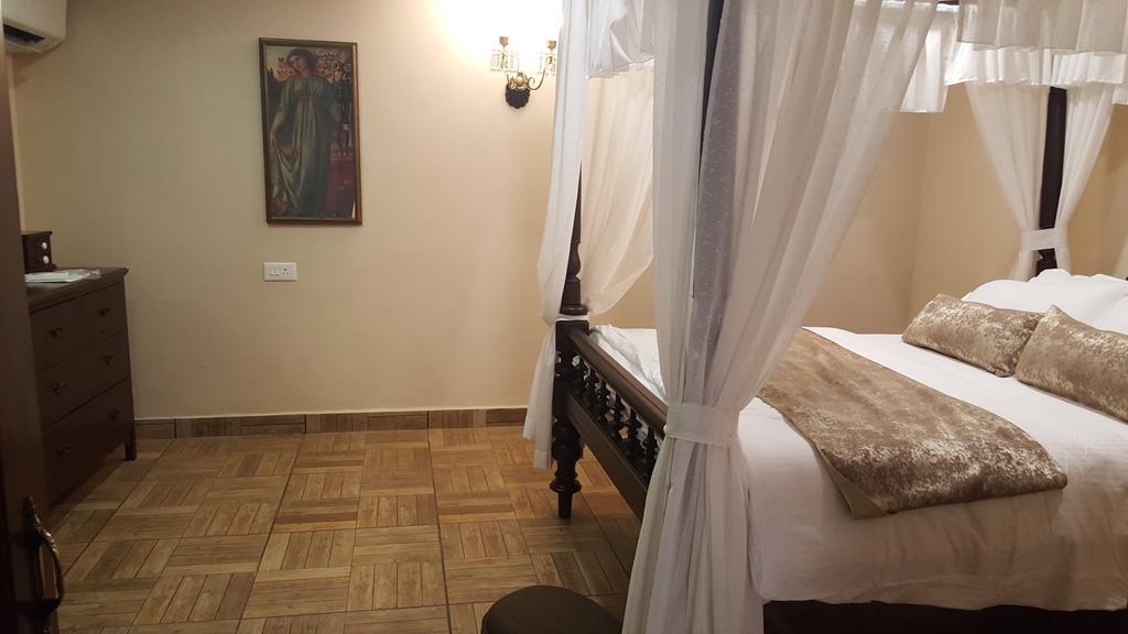 Casa Menezes - A Heritage Goan Homestay Bambolim Δωμάτιο φωτογραφία